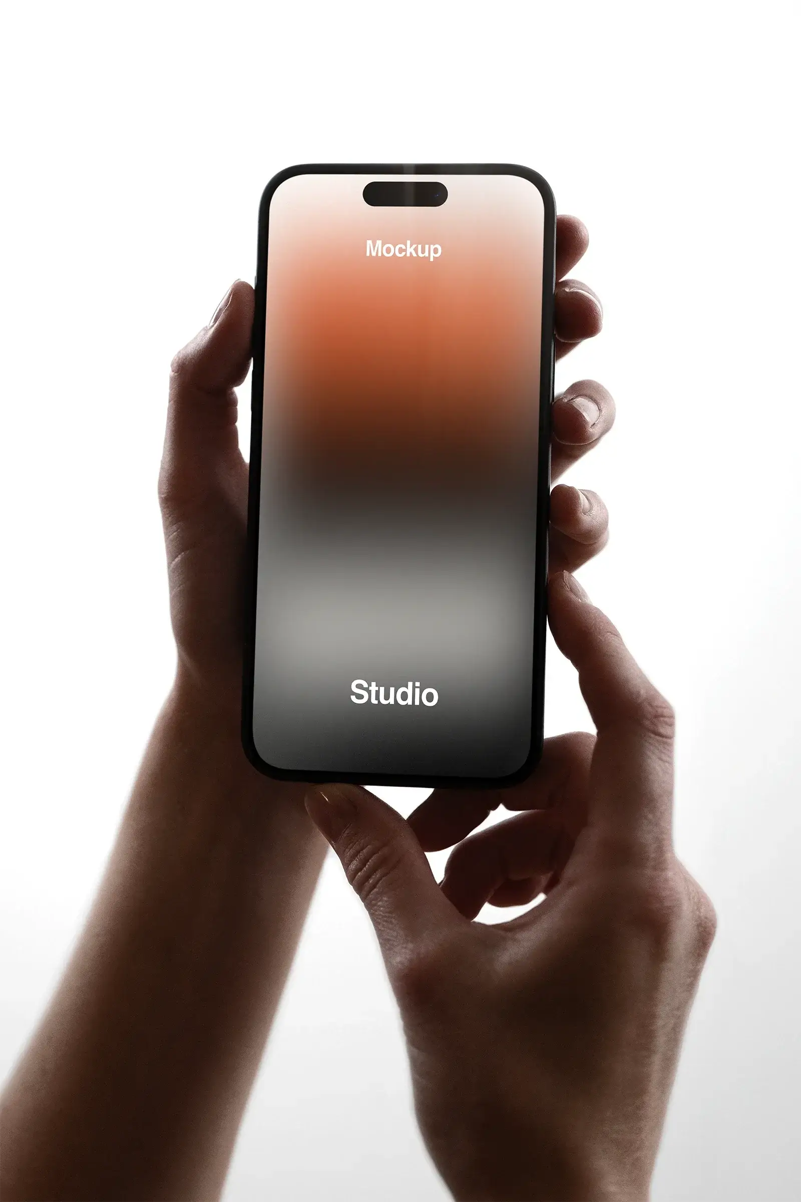 Handheld iPhone Mockup in a photo studio in New York - BRANDACLE