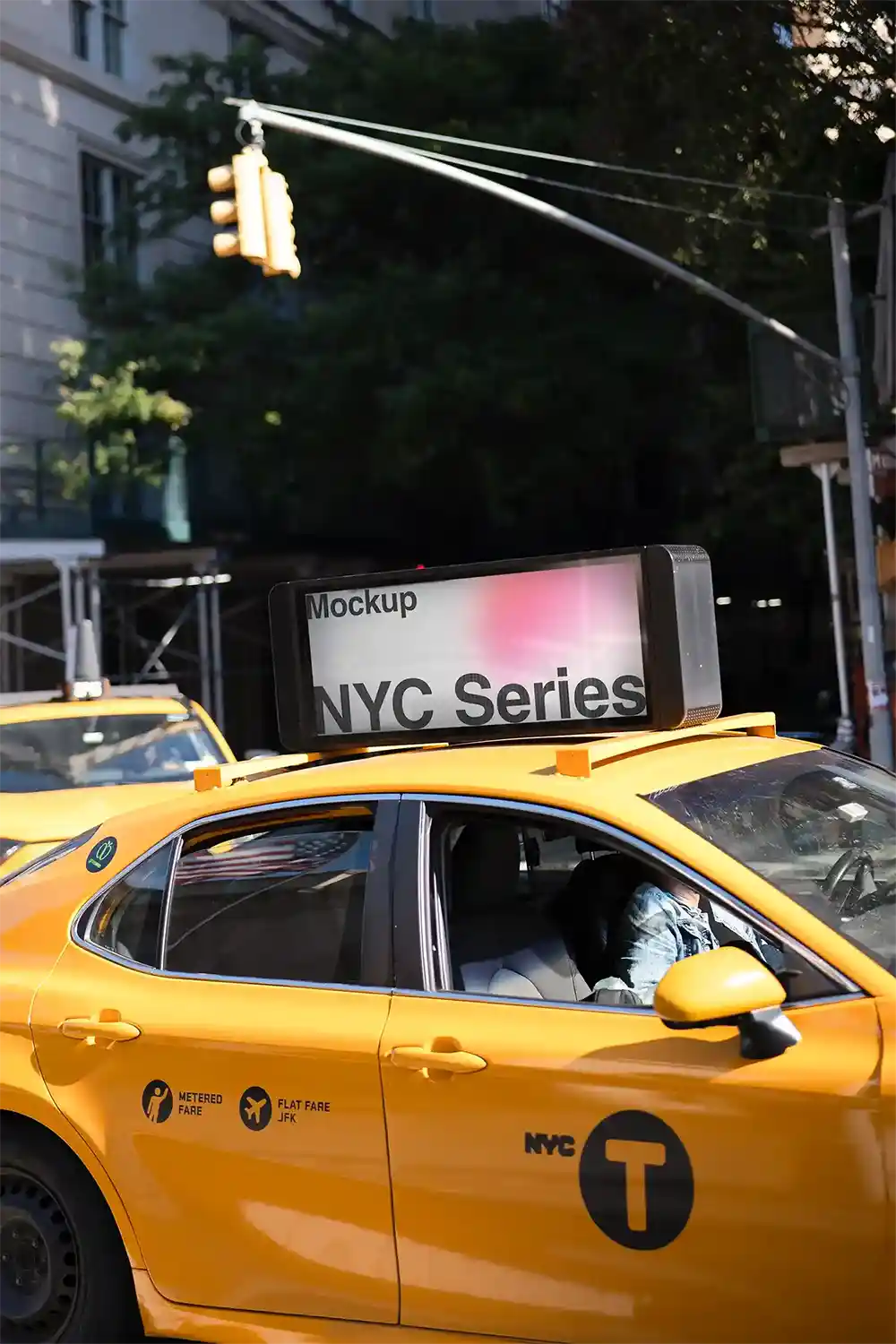 Taxi cab with a billboard mockup on top in New York, United States