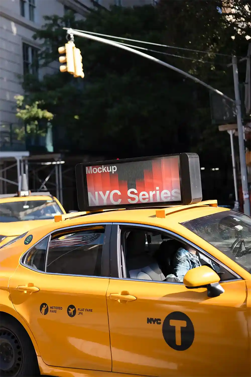 Taxi cab with a billboard mockup on top in New York, United States
