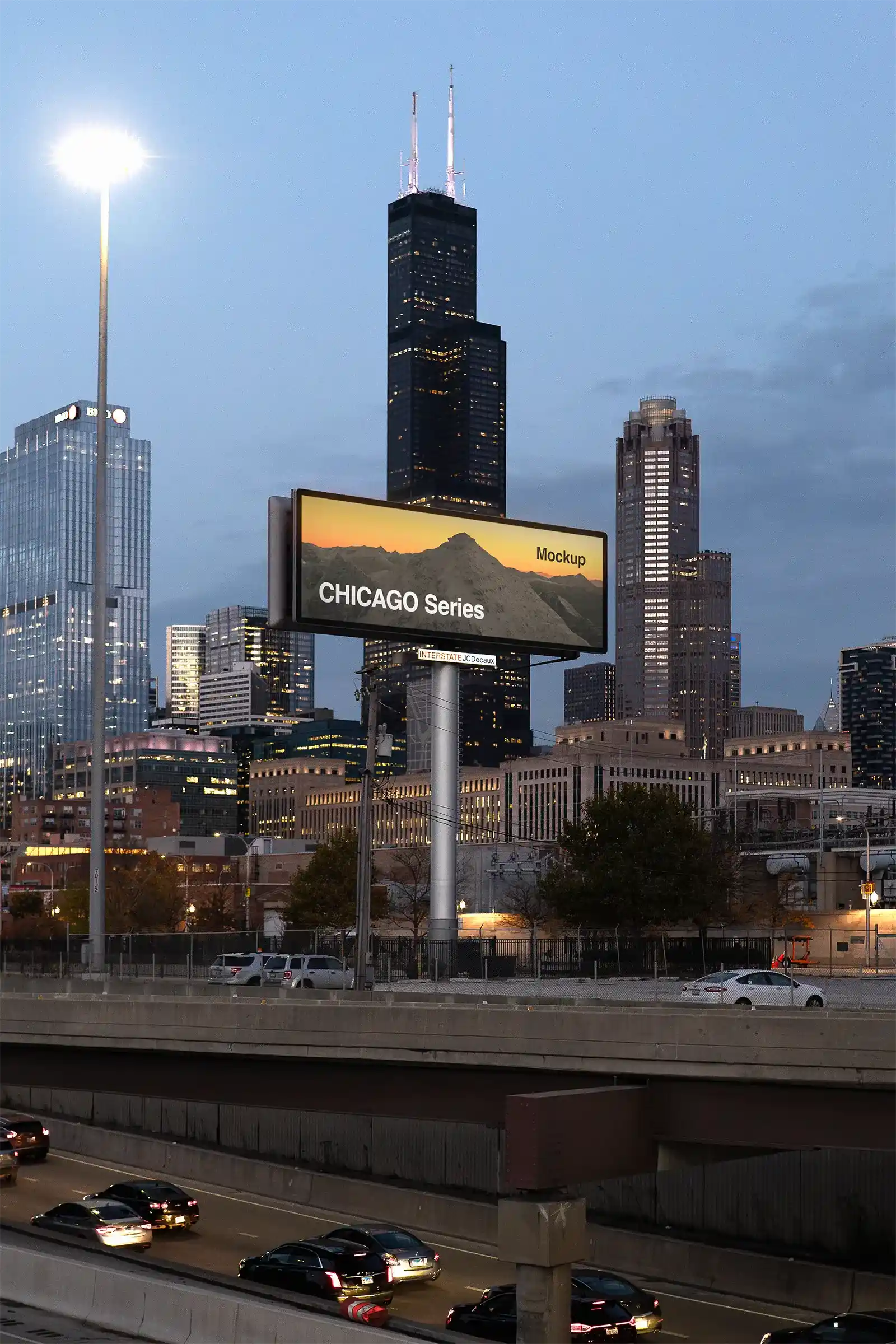 Billboard mockup by the highway in Chicago, United States, in fornt of the Sears Tower at dusk