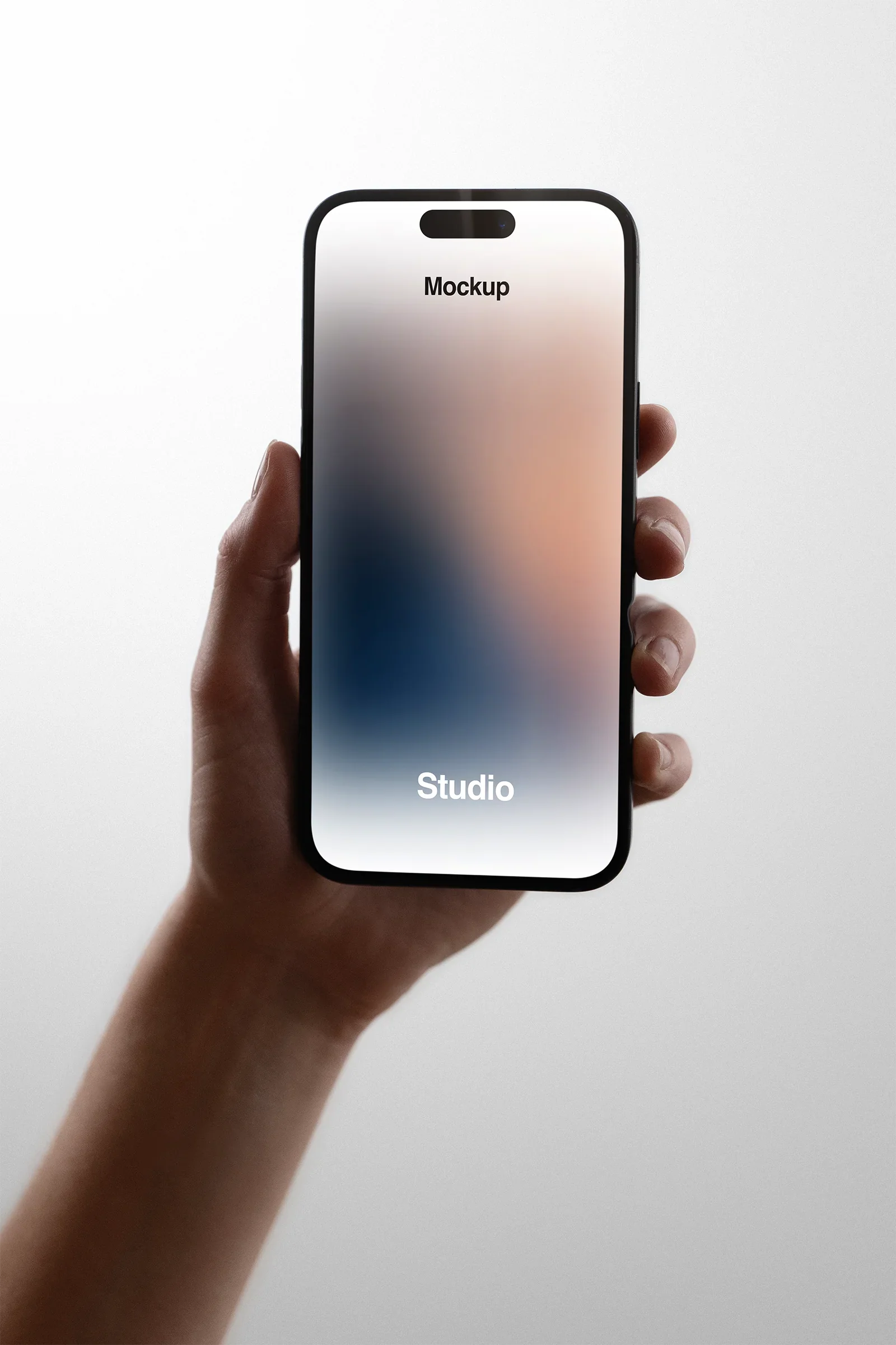 Handheld iPhone Mockup in a photo studio in New York - BRANDACLE