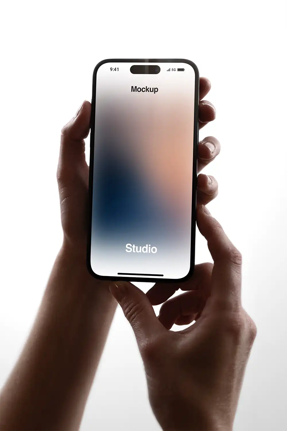 Handheld iPhone Mockup in a photo studio in New York - BRANDACLE