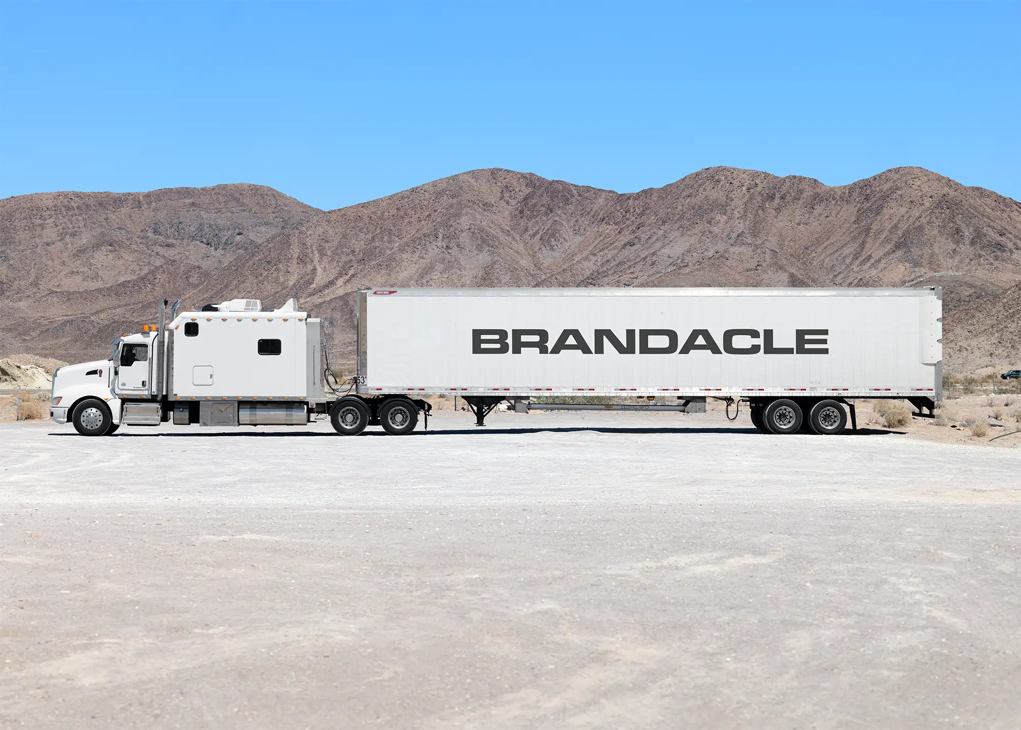 Truck  with a logo mockup in the desert in California