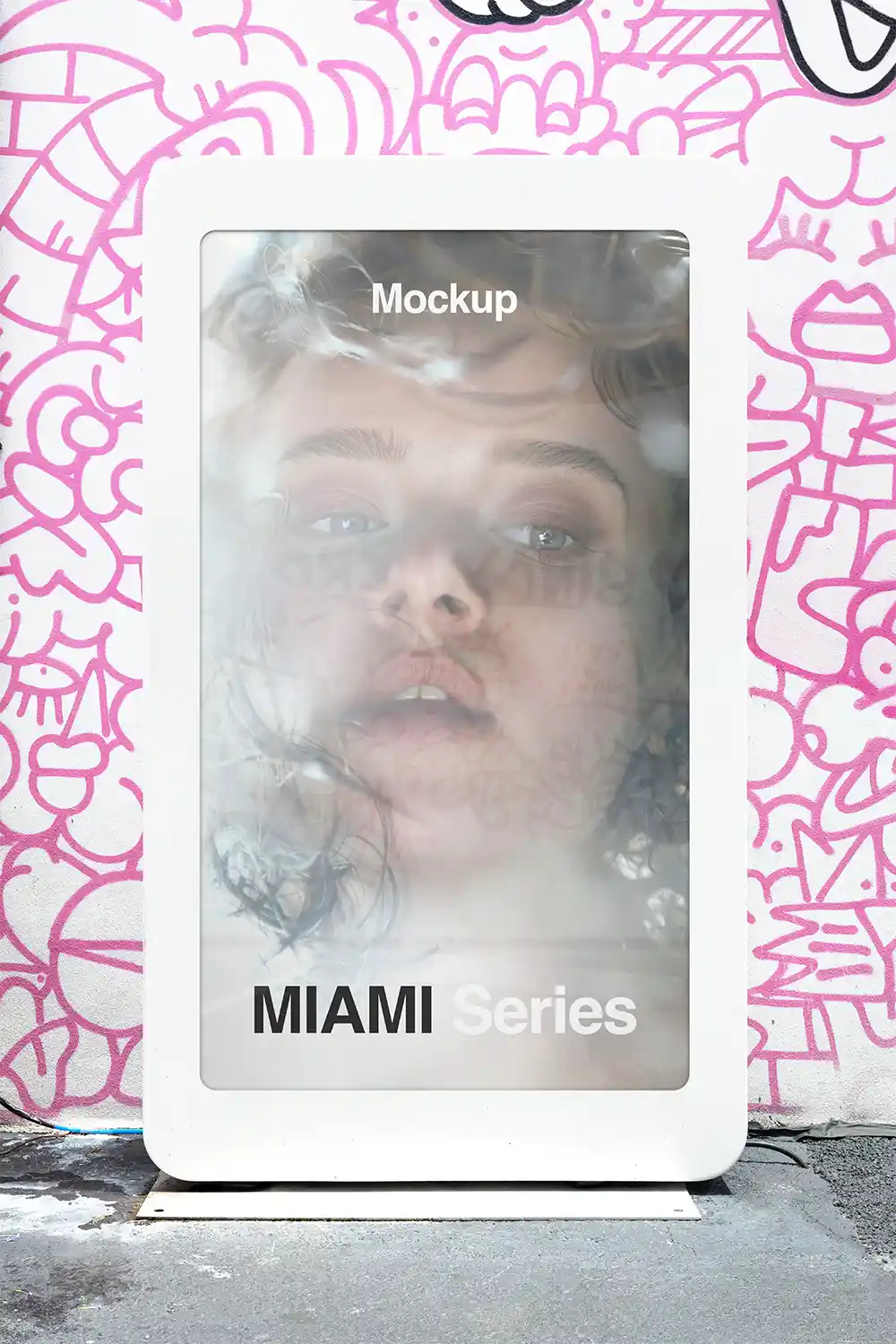 Digital poster mockup in front of mural in Miami, Florida