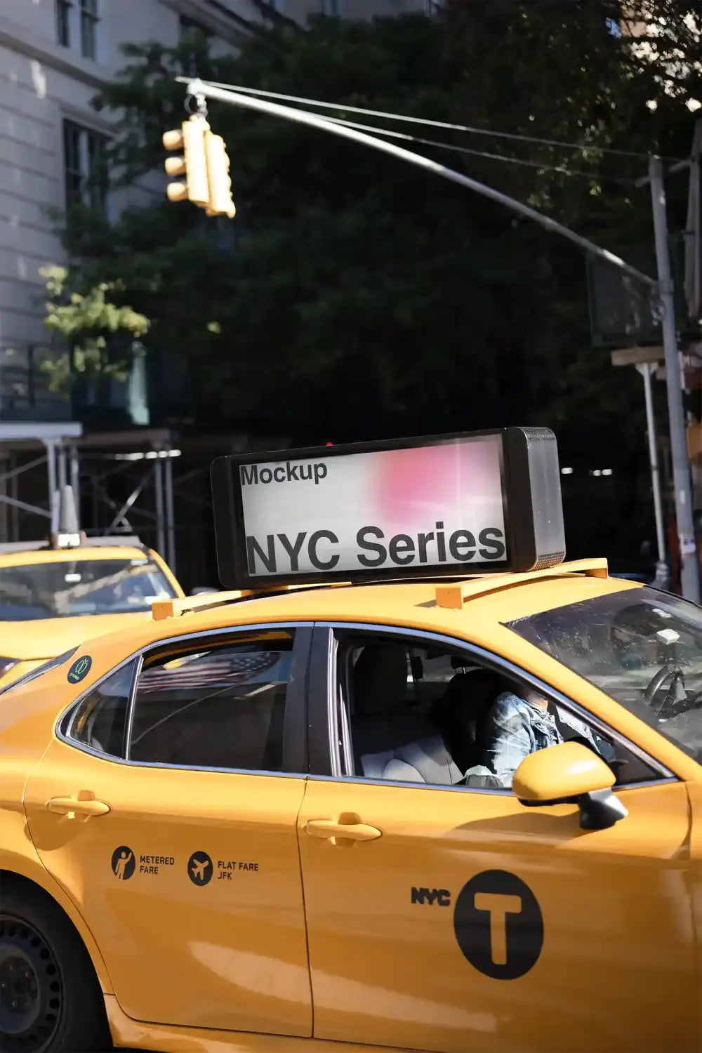 Billboard mockup on a taxi cab in Manhattan in New York. © BRANDACLE MOCKUPS 2026.