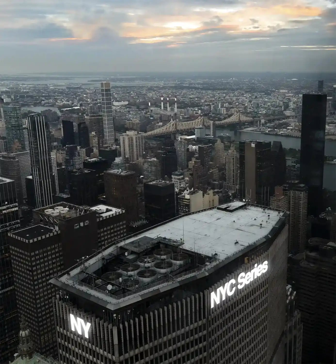 Logo mockup on a skyscraper building in Manhattan, New York. © BRANDACLE MOCKUPS 2026. 