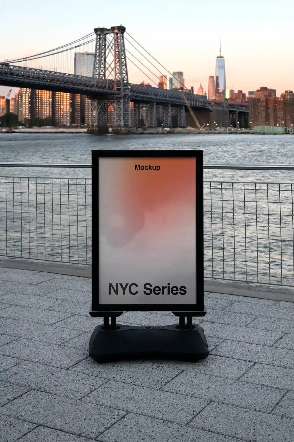 Poster mockup in Brooklyn against the backdrop of the Manhattan skyline and the Williamsburg Bridge at dawn in New York. © BRANDACLE MOCKUPS 2026