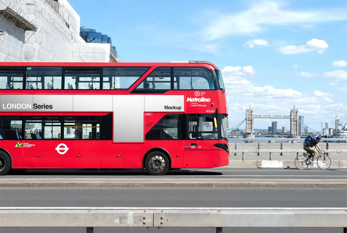 Red bus poster mockup against the backdrop of the iconic Tower Bridge in Central London