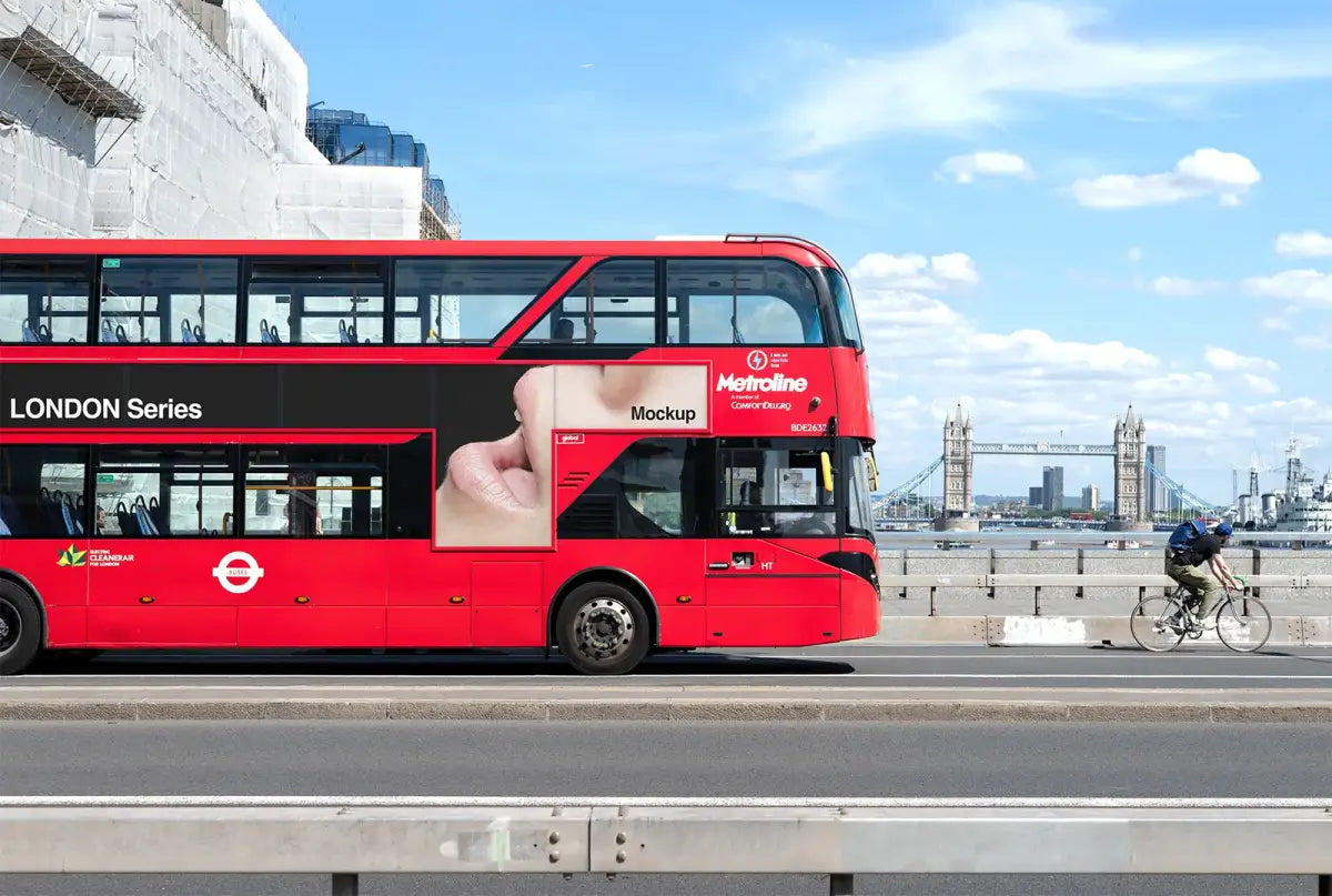 Red bus poster mockup against the backdrop of the iconic Tower Bridge in Central London