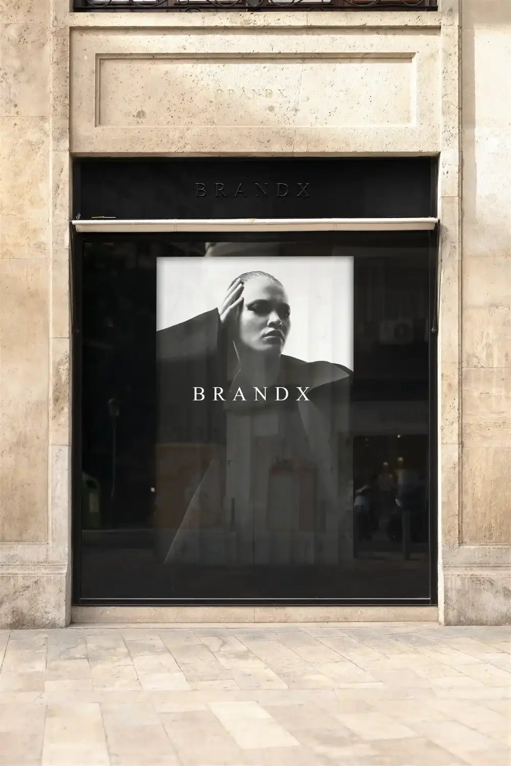 Storefront shop logo mockup in Valencia, Spain. © BRANDACLE MOCKUPS 2026