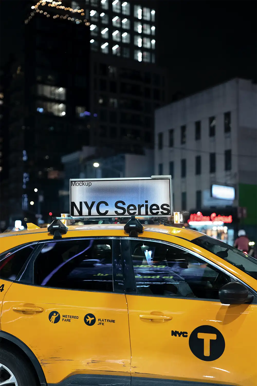 Digital billboard on a yellow cab taxi on Times Square in New York