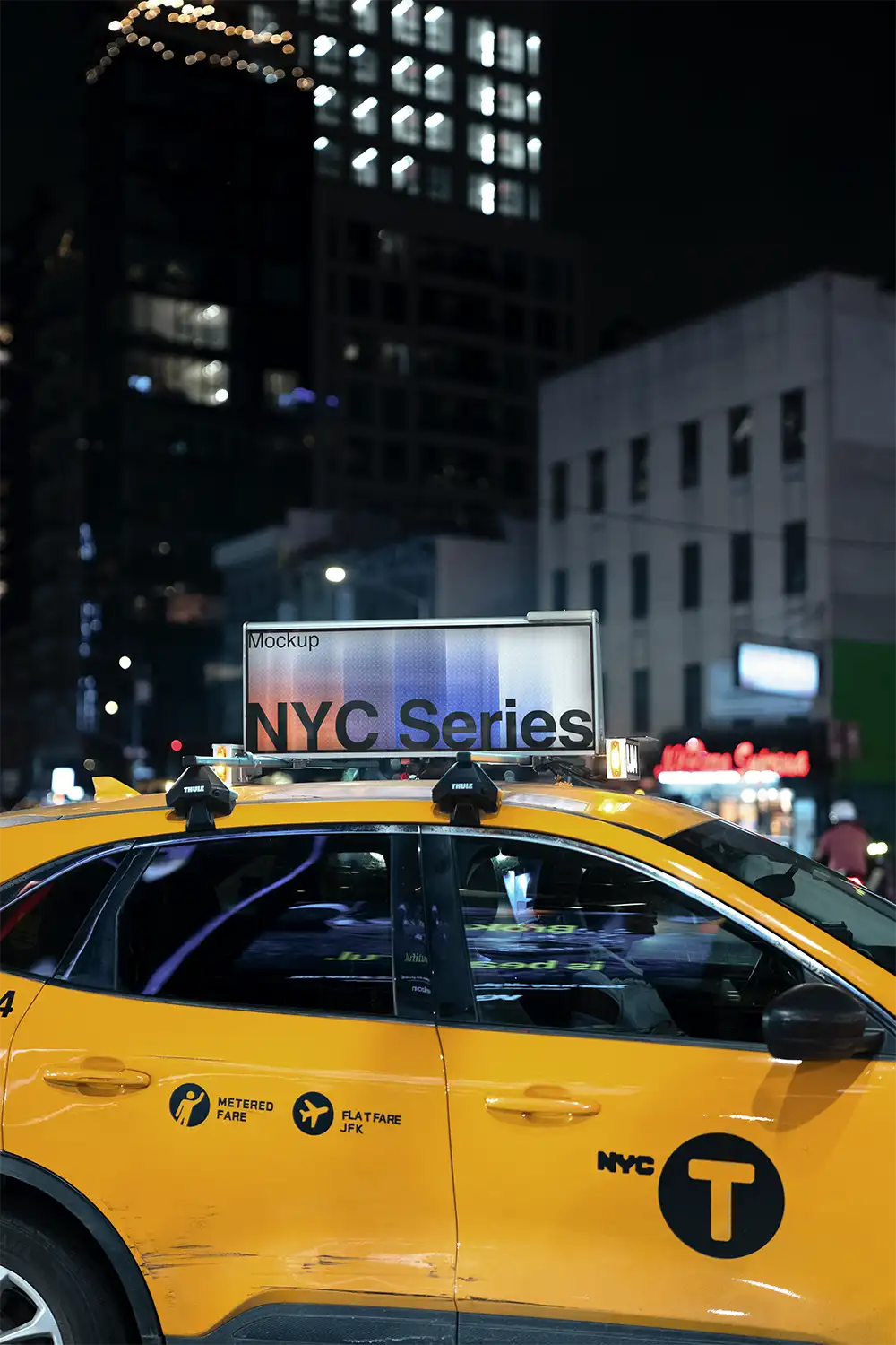 Digital billboard on a yellow cab taxi on Times Square in New York