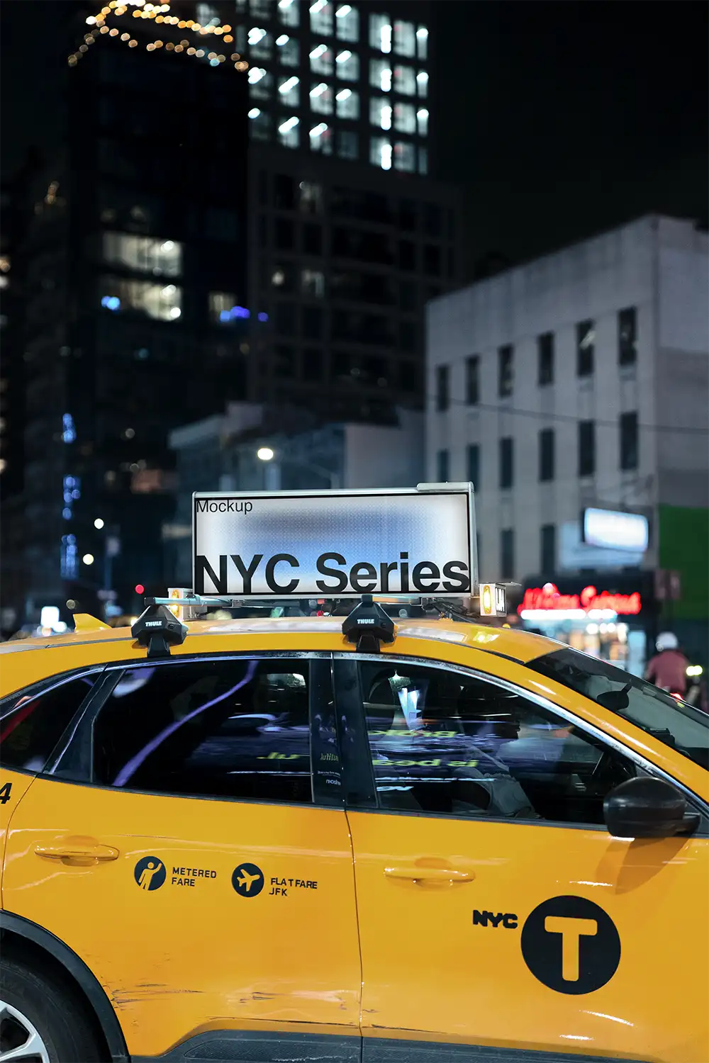 Digital billboard on a yellow cab taxi on Times Square in New York