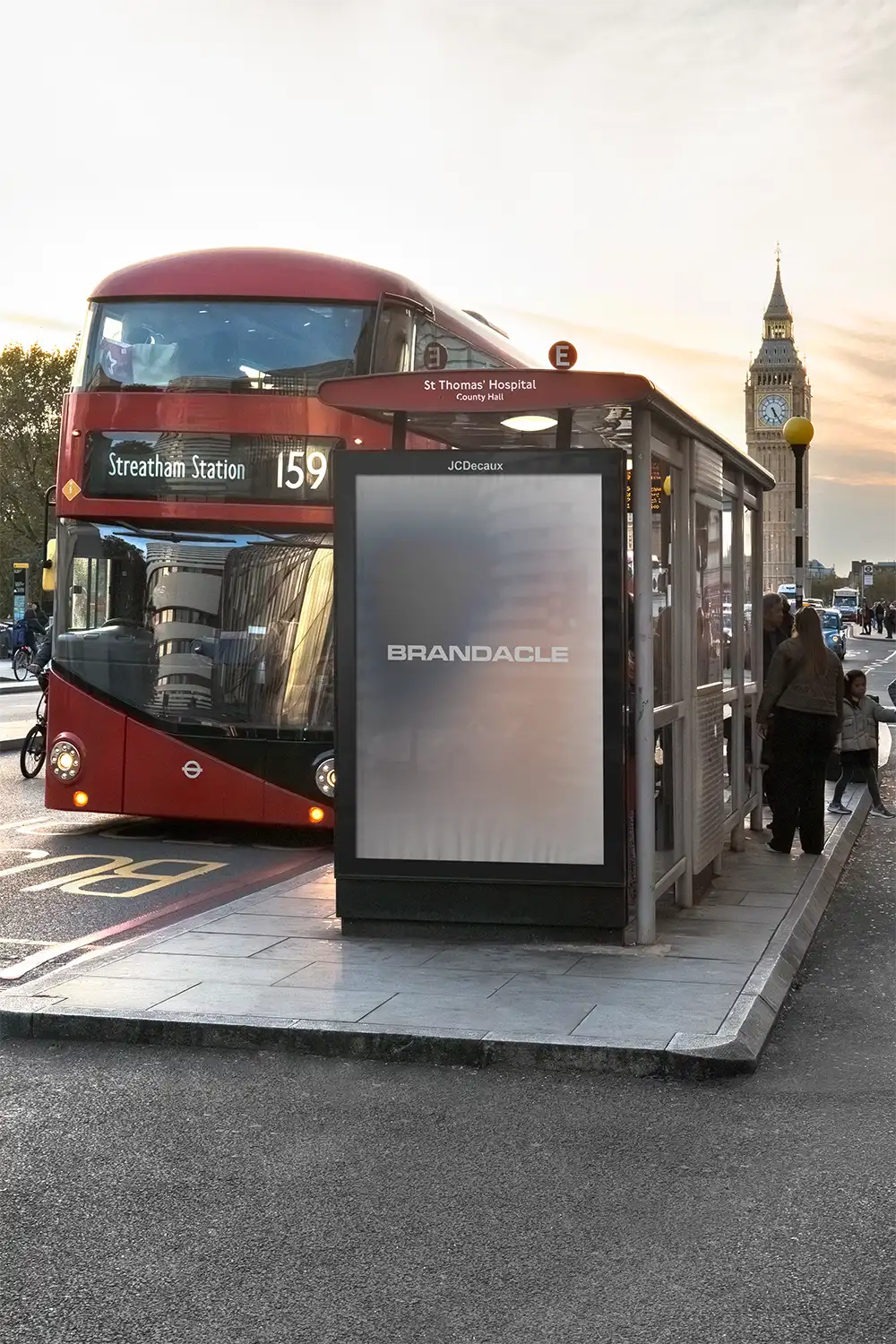 Billboard mockup on a bus shelter in Westminster with Big Ben in London. © BRANDACLE MOCKUPS 2026.