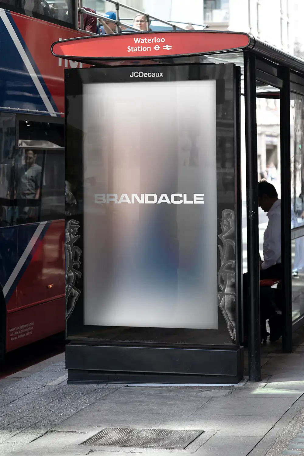 Billboard mockup on a bus shelter at Waterloo Station in London. © BRANDACLE MOCKUPS 2026.