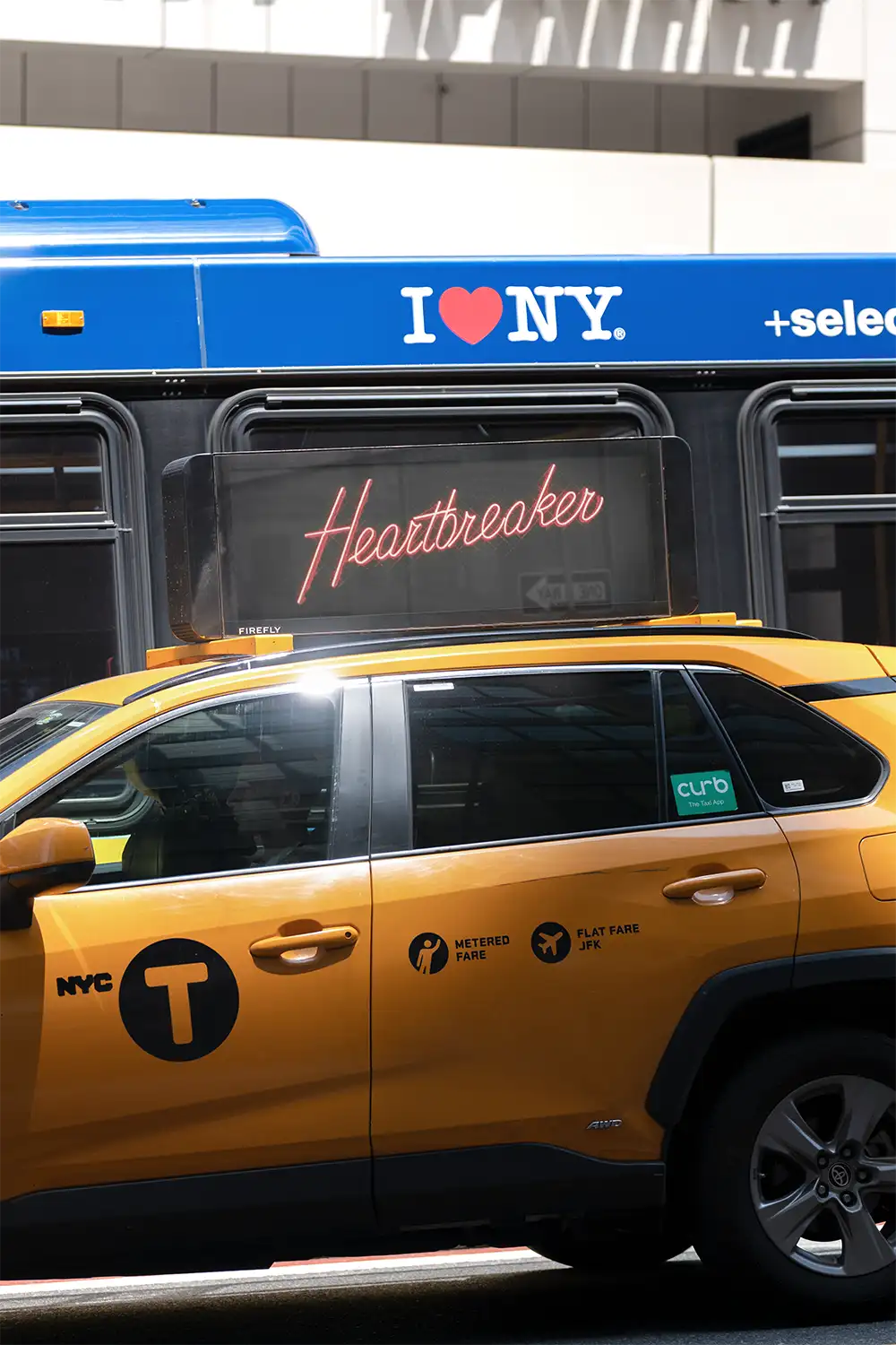 Billboard mockup on a yellow cab taxi in New York