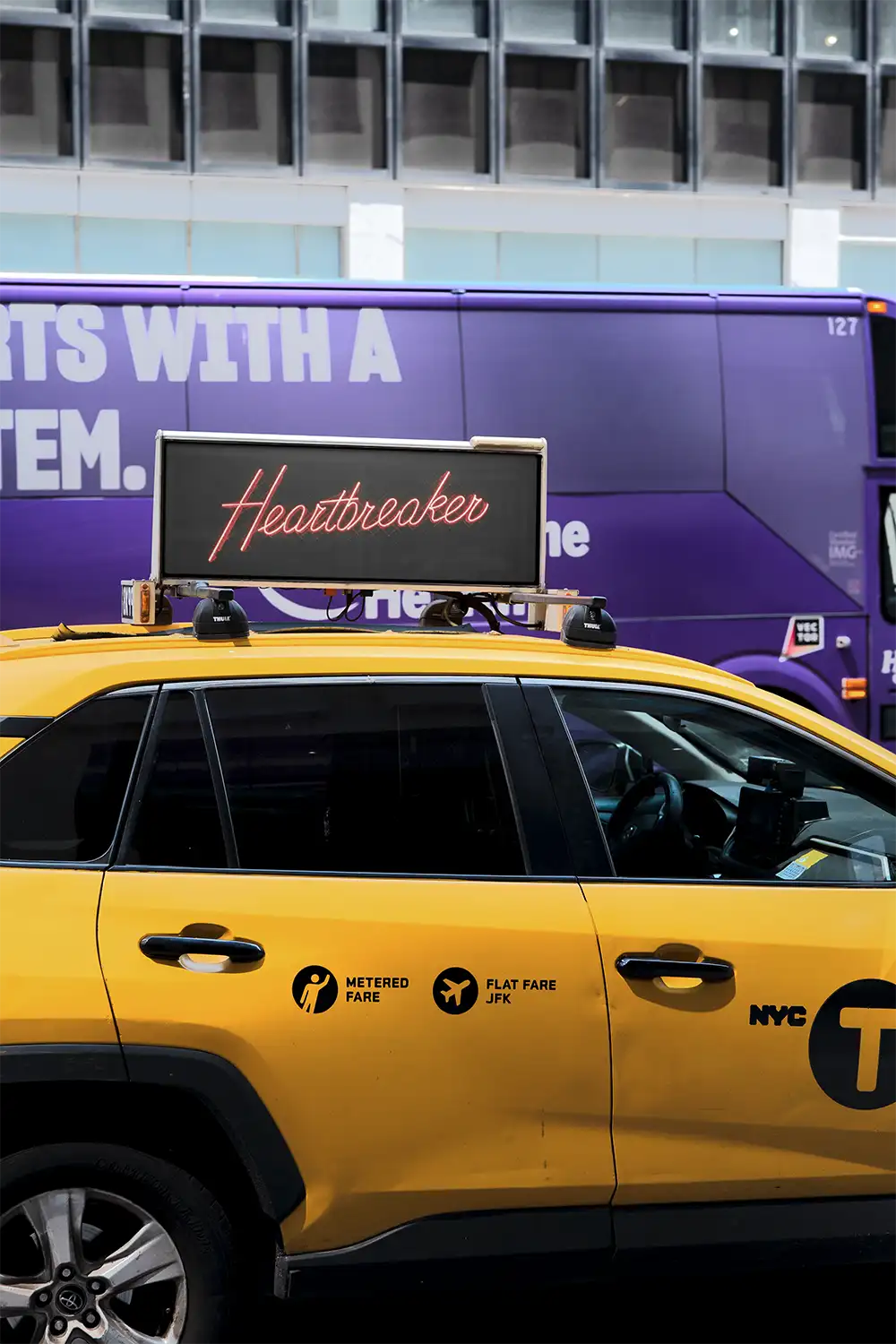 Digital billboard mockup on a yellow taxi cab in NewYork